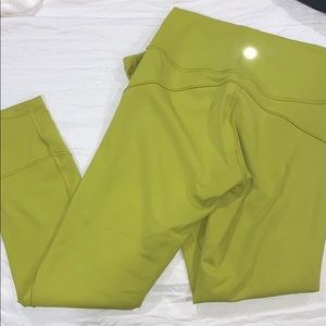 Green lululemon leggings.